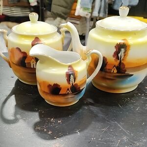 Charming Ceramic Tea Set with Scenic Design